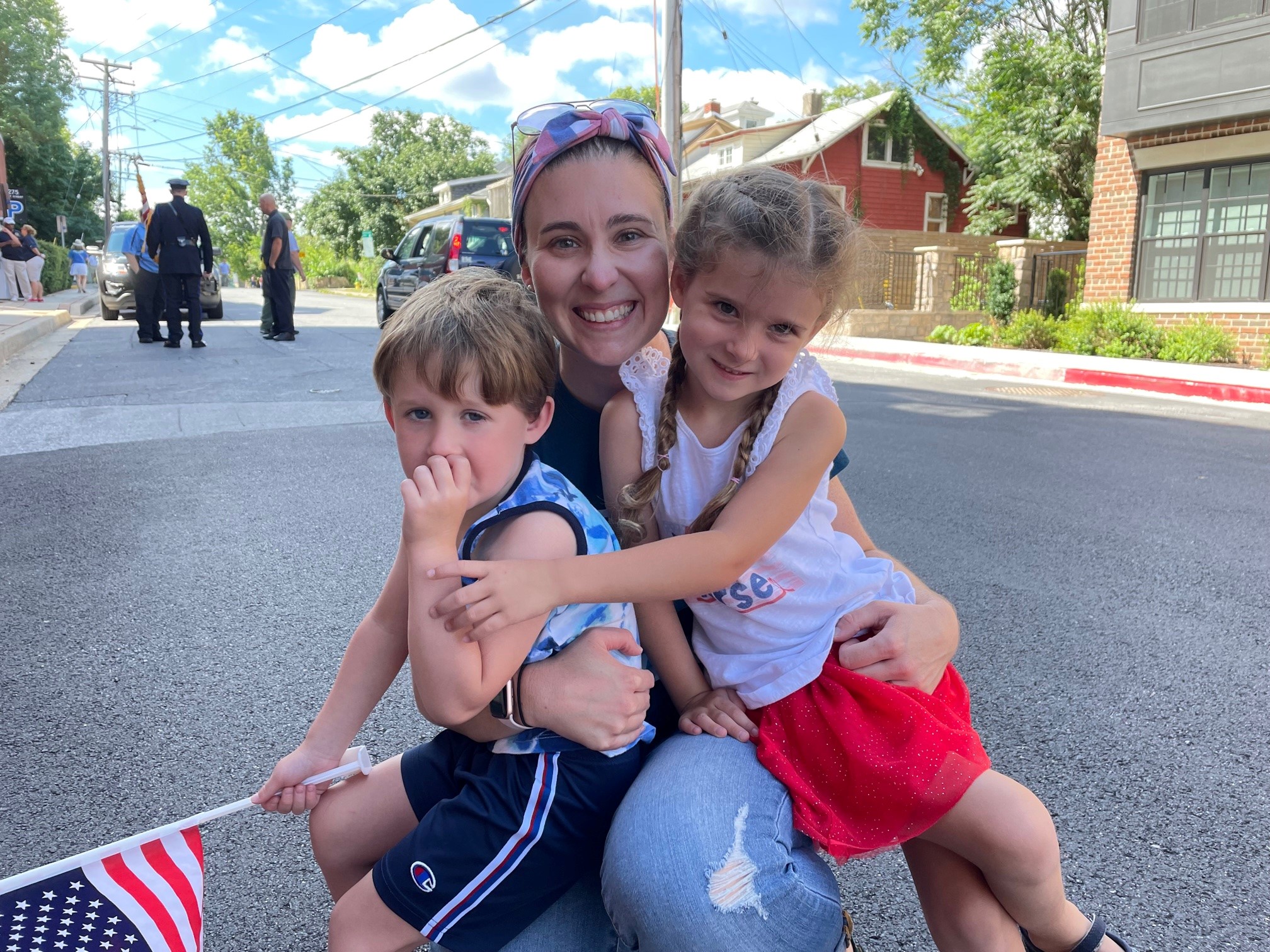 Nurse posing with her two children