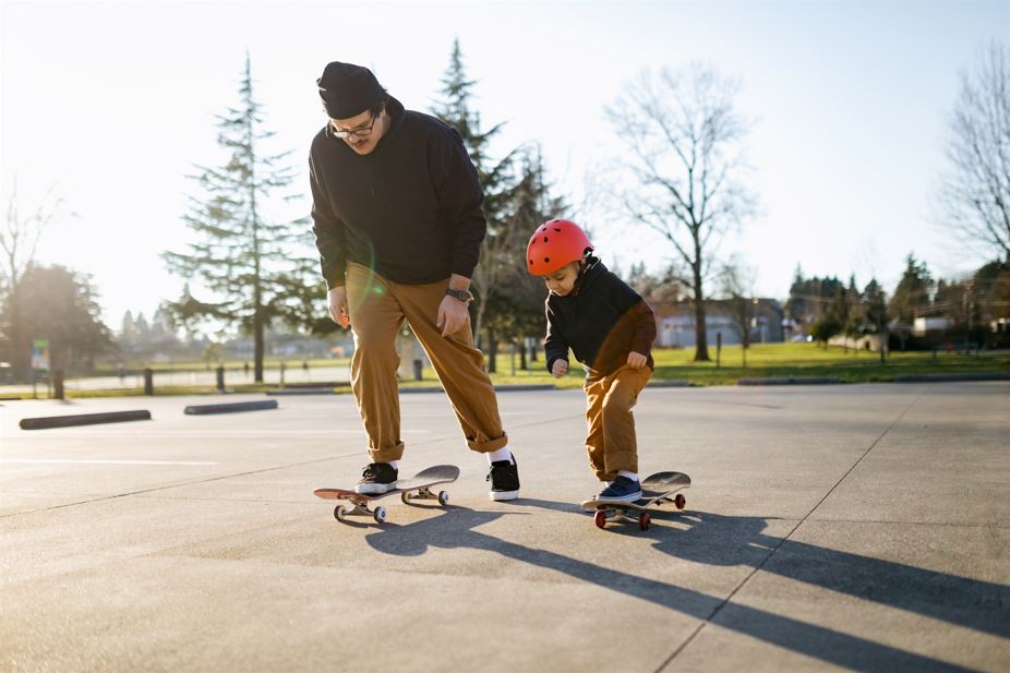 Father and son skateboarding