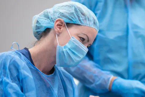Nurse looking at patient