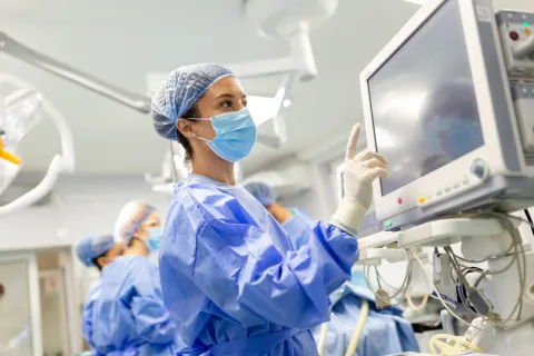 Nurse looking at a screen