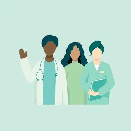 Doctor waving hello next to a patient and nurse