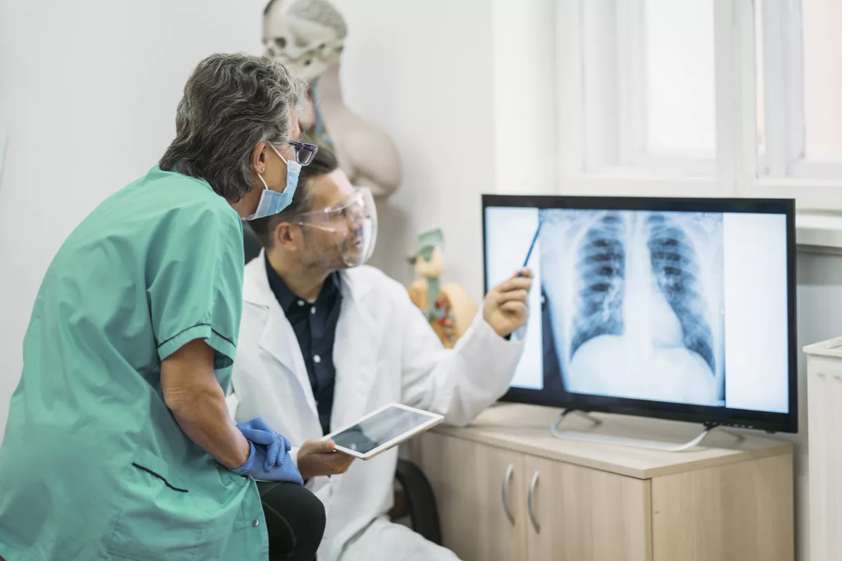 medical staff reviewing x-rays