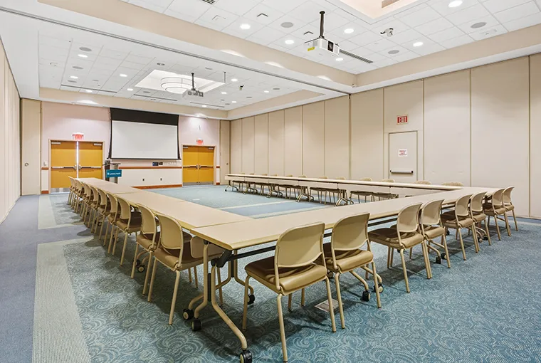 A quarter of the Doordan Institute ballroom space, set for a seminar.